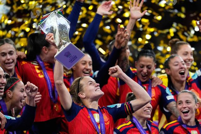 Spain’s team captain Irene Paredes lifts the Women’s Nations League trophy after winning beating Germany 3-0 in Madrid yesterday.