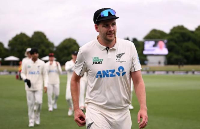Jacob Duffy leads the team off the field after picking up his second five-wicket haul in Tests against the West Indies.