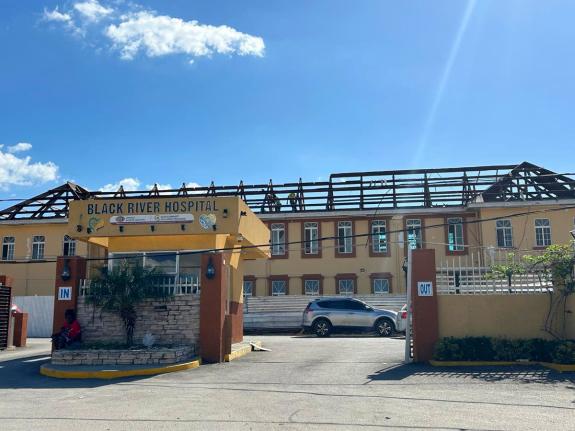 This photo shows roof repairs being undertaken at the Black River Hospital.