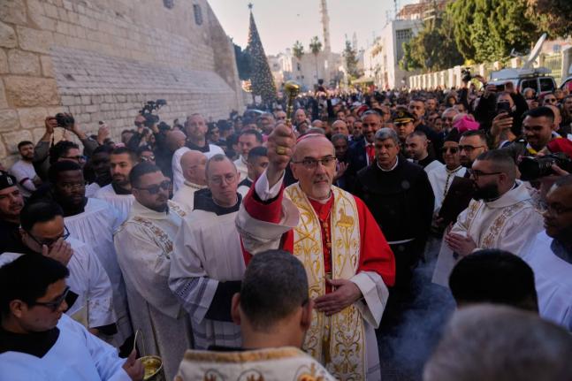 Latin Patriarch Pierbattista Pizzaballa, the top Catholic clergyman in the Holy Land, arrives at the Church of the Nativity, traditionally believed to be the birthplace of Jesus, on Christmas Eve, in the West Bank city of Bethlehem on December 24, 2025.