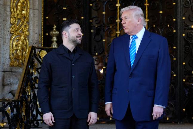 US President Donald Trump greets Ukraine's President Volodymyr Zelenskyy at his Mar-a-Lago club on December 28, 2025, in Palm Beach, Florida.
