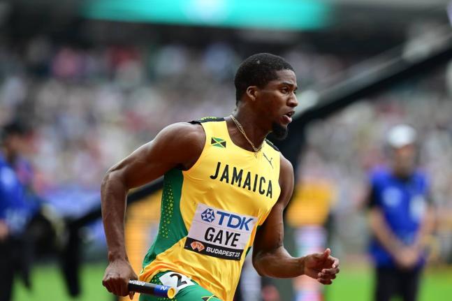 Demish Gaye runs the opening leg of the 4x400m Mixed Relay at the  2023 World Athletics Championships in Budapest, Hungary, on Saturday, August 19, 2023. 