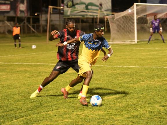 
Racing United FC’s Nickyle Ellis (right) moves away from Arnett Gardens’ Joel Jones during a Jamaica Premier League fixture at the Anthony Spaulding Sports Complex on December 29, 2025.