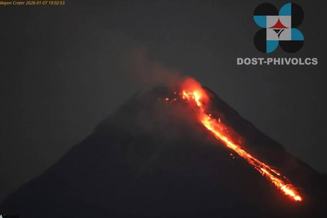 In this photo provided by the Philippine Institute of Volcanology and Seismology, lava flows form the crater of the Mayon volcano as alert level 3 remains in the Albay province, north eastern Philippines on Wednesday, January 7, 2026. (Philippines Institut