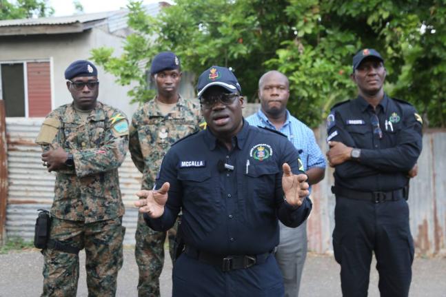 Senior Superintendent of Police Shane McCalla, commanding officer for the Clarendon division, makes a point.