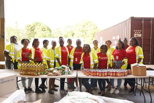 In observance of International Volunteer Day, more than 40 members of the Scotiabank team gathered at Food For The Poor’s warehouse to support ongoing Hurricane Melissa relief efforts. Volunteers assembled 2,000 food and care packages, helping to bring c