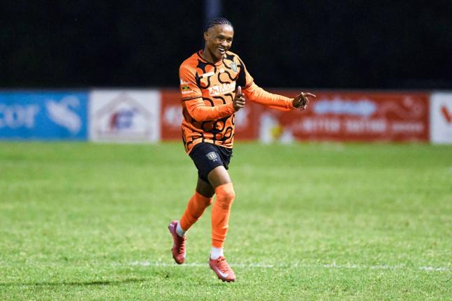 Nickalia Fuller of Tivoli Gardens FC celebrates scoring a goal of the Jamaica Premier League football match against Waterhouse Football Club at Stadium East on December 8, 2025.