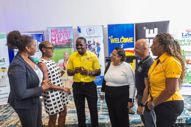 Kurt Dunn (3rd left), CEO, BodybyKurt FitFest Party & Expo, shares a photo op with  Juliet Cuthbert Flynn (second left), state minister for National Security & Peace, and sponsors (from left) Diahann Gordon Harrison, Children’s Advocate; Hillary Coulton,