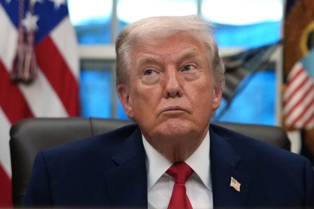 President Donald Trump listens during an event on addiction recovery in the Oval Office of the White House, Thursday, January 29, 2026, in Washington. (AP Photo/Allison Robbert)