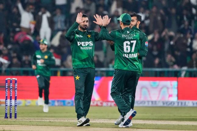 Pakistan’s Abrar Ahmed (left)  celebrates with teammates after the dismissal of Australia’s Cooper Connolly during the first T20 cricket match between Pakistan and Australia, in Lahore, Pakistan, Thursday, January 29, 2026.