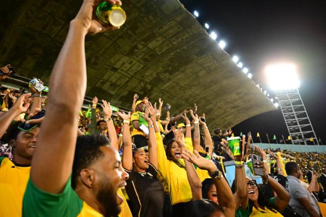 A crowd inside the Grand Stand at the National Stadium.