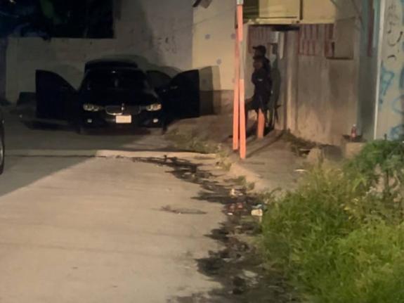 Policemen at a scene off Waltham Park Road in St Andrew on February 10 where a soldier was killed and a policeman wounded in a gun attack.