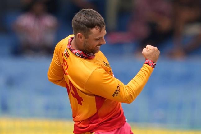 Zimbabwe's Ryan Burl celebrates the wicket of Australia's Glenn Maxwell during the T20 World Cup cricket match between Australia and Zimbabwe in Colombo, Sri Lanka on February 13, 2026. 