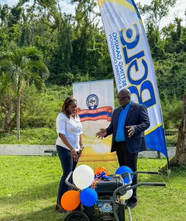 Electrified - that’s the word and all that is captured here with Roger Clarke High principal George Lewis showing appreciation in receiving a generator donated from the Betting Gaming and Lotteries Commission (BGLC) through their Corporate Affairs and Co