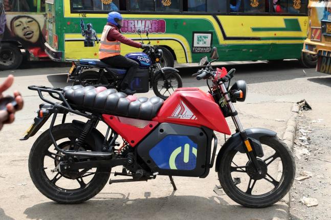 A man rides an electric Spiro motorcycle in Nairobi, Kenya, on Tuesday, February 24, 2026. 
