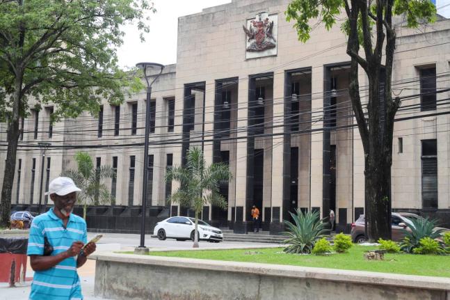 The country's coat of arms is displayed on the facade of a government building in Port-of-Spain, Trinidad and Tobago, Tuesday, August 20, 2024.