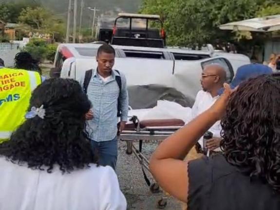 Persons at the scene of a crash in Bridgeport, Portmore, St Catherine on March 4, 2026.