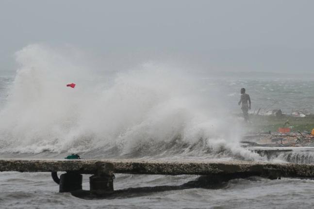 Waves splash in Kingston, Jamaica as Hurricane Melissa approaches on Tuesday, October 28, 2025. 