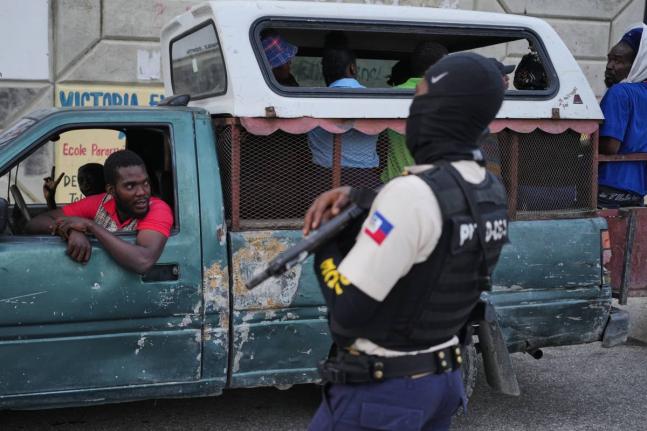 A police officer stands guard in Port-au-Prince, Haiti.