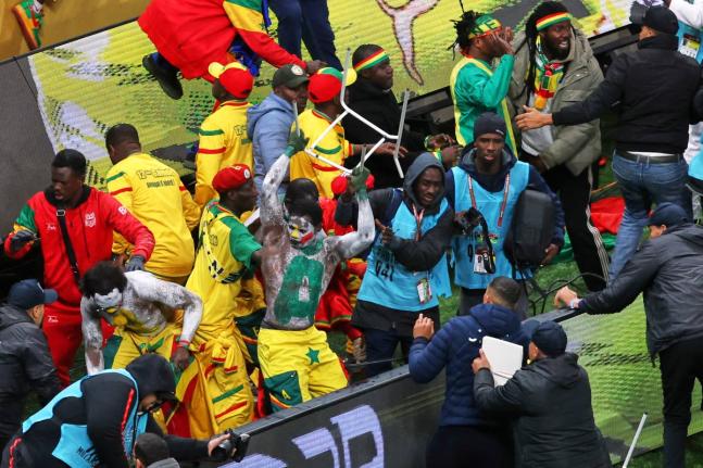 Senegal supporters protest after a controversial penalty was awarded to Morocco during the Africa Cup of Nations final soccer match between Senegal and Morocco on January 18, 2026, in Rabat, Morocco. (AP Photo/Youssef Loulidi, File)
