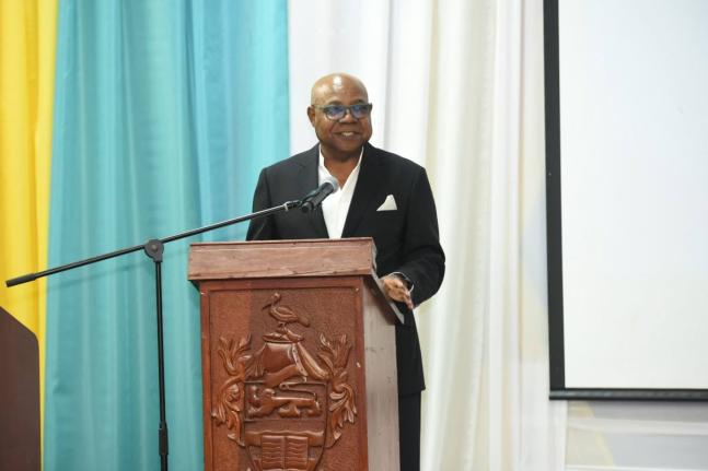 Tourism Minister Edmund Bartlett addressing students at the Jamaica Youth Tourism Summit and Artisan Experience in Montego Bay.