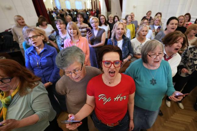 Choir members perform a song during a practice in Belgrade, Serbia.