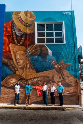 Contributed
Officials and artists mark the official unveiling of Crafting Culture, a new large-scale mural on Church Lane, Montego Bay, St James, on the same building as Hilton Pharmacy. Anthony ‘Taoszen’ Smith (left), lead muralist; Councillor Richard