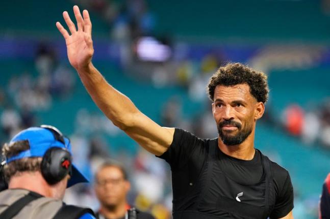 AP 
Cape Verde goalkeeper Vozinha waves to supporters following the World Cup Group H football match against Uruguay in Miami Gardens, Florida, Sunday, June 21.