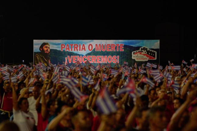 A billboard depicting the late leader Fidel Castro and reading “Homeland or death, we will defeat!” is seen during an event marking the 73th anniversary of the start of the Cuban Revolution in Pinar del Rio, Cuba.