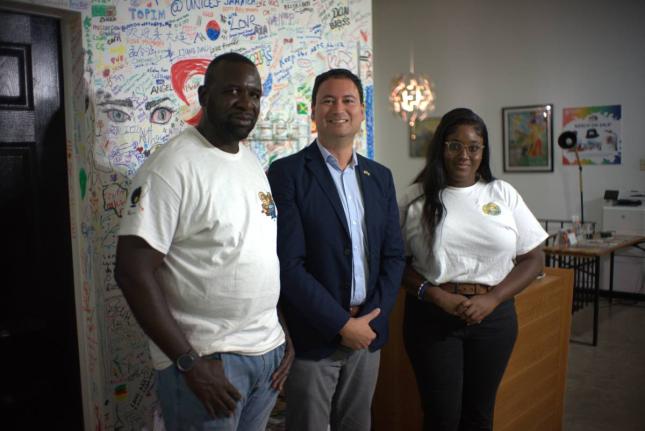  Dwayne ‘Stewie’ Stewart, co-founder and festival director of Films That Move; Paul Stilley, Deputy Public Affairs at the United States; and Alicia Walker, programme director of Films That Move, share a moment during the latest edition of the film scre