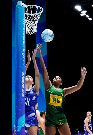 Azara Wilmot of Jamaica (right) and Cerys Finn of Scotland in action during the Netball Preliminary Round Pool B match at the Commonwealth Games in Glasgow, Scotland on Wednesday. 