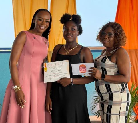 Councillor Waynette Strachan Nelson (left) shares a proud moment with Zoey Clarke (centre), a Hagley Park PEP High Achiever, joined by her mother, Angela Radcliffe, during the inaugural Hagley Park PEP High Achievers Luncheon at the JACDEN Medical Rooftop 