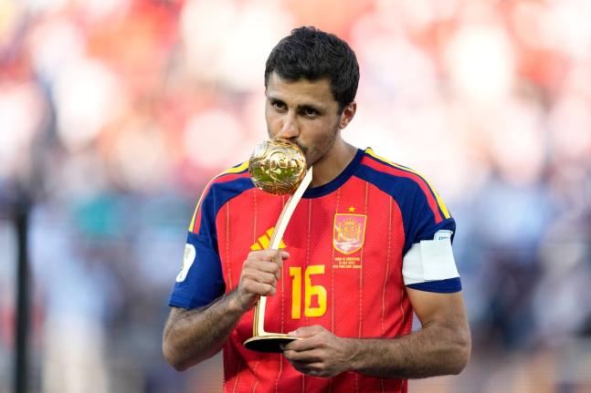 Spain’s Rodri poses with the tournament’s best player award at the end of the World Cup final between Spain and Argentina in East Rutherford, New Jersey, on July 19, 2026. 