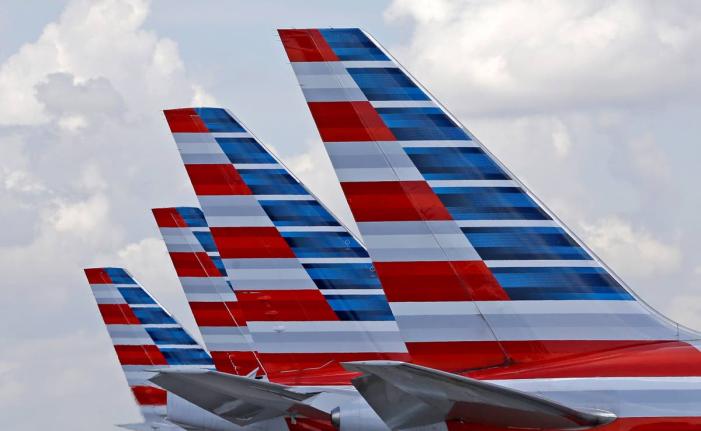 American Airlines passenger planes are parked at Miami International Airport in Miami, Florida, on July 17, 2015.