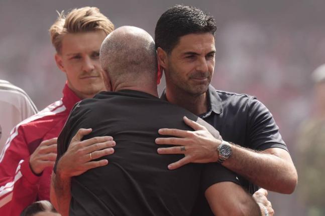 Arsenal’s manager Mikel Arteta (right) hugs Manchester City’s head coach Enzo Maresca prior to the FA Community Shield final soccer match in Cardiff, Wales, on Sunday.