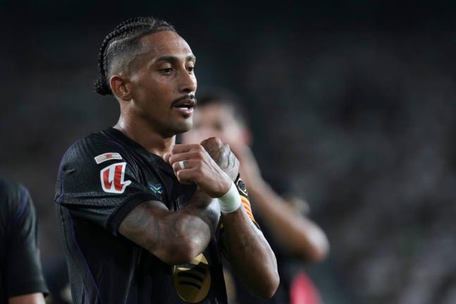 Barcelona’s Raphinha celebrates after scoring his side’s third goal during a Spanish La Liga football  match between Elche and Barcelona in Elche, Spain, yesterday.