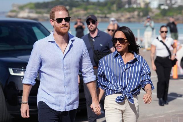  Prince Harry, and Meghan, the Duke and Duchess of Sussex, arrive for an event, during a visit to Bondi Beach, Australia, April 17.
