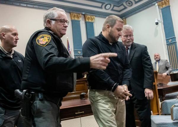 Jeriah Mast, a former missionary for Christian Aid Ministries, is taken into custody after his sentencing at Holmes County Courthouse Tuesday, November 5, 2019 in Millersburg, Ohio. 