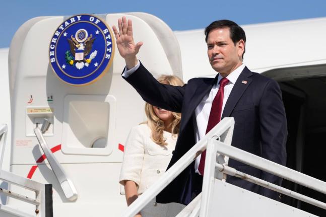US Secretary of State Marco Rubio and his wife Jeanette Rubio depart the international airport Ernesto Cortissoz in Barranquilla, Colombia, September 9.