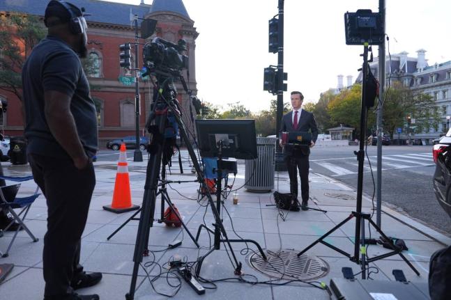 Vaughn Hillyard, White House correspondent for MS NOW, does a report near the White House in Washington on Monday. - AP photo