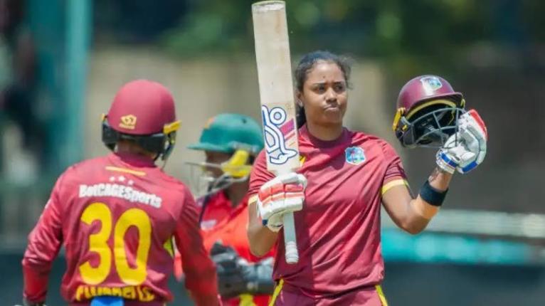West Indies Women’s captain Hayley Matthews (right) celebrates after scoring her 13th ODI century against Zimbabwe.