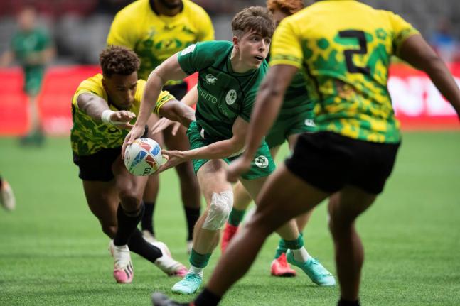 
Ireland’s Sean Kearns passes the ball during an HSBC Canada Sevens rugby game against Jamaica in Vancouver, British Columbia, Saturday, September 18, 2021.