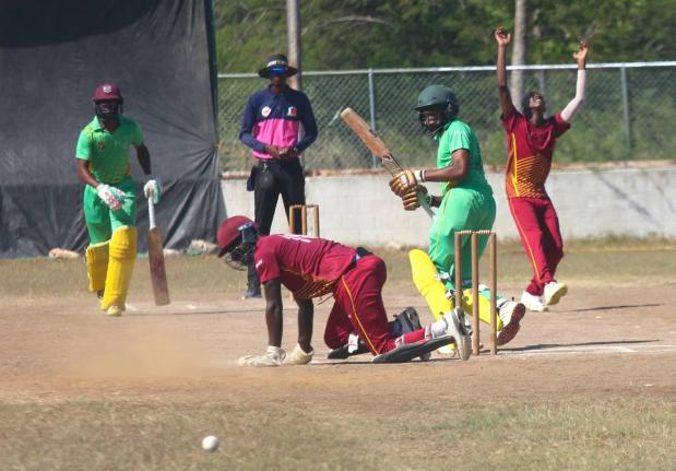 St Catherine CA bowler Ranjay Thomas throws his hands in the air as the ball evades wicketkeeper Amanjah Morris during the JCA Super 50 Cup match at Port Esquivel at the weekend. Also watching the action are  Clarendon CA batsmen Teino Osbourne and Justin 