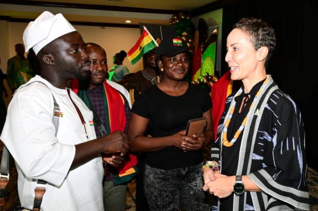 Minister of Foreign Affairs and Foreign Trade, Senator Kamina Johnson Smith (right), engages with Ghanian nurses (from left) Kelvin Odonkor, Evans Yeboah Asante and Anita Asiedu. Occasion was a welcome reception in honour of the first cohort of 43 nurse sp