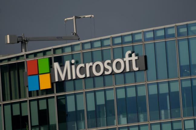 FILE - The logo of Microsoft is seen outside its French headquarters in Issy-les-Moulineaux, outside Paris, on May 13, 2024. (AP Photo/Thibault Camus, File)