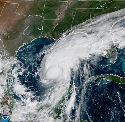 This satellite image from the National Oceanic and Atmospheric Administration shows Category 2 Hurricane Isaias surging toward the US Gulf Coast on Thursday.