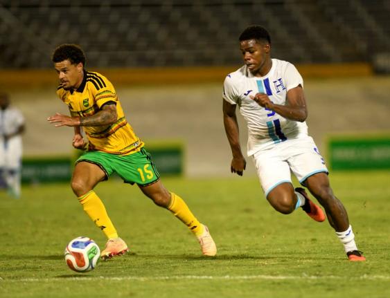 Jamaica’s  Joel Latibeaudiere (left) and  Keyrol Figueroa of Honduras go in chase of the ball during the Concacaf Nations League fixture between Jamaica and Honduras held on September 28, 2026 at the National Stadium.