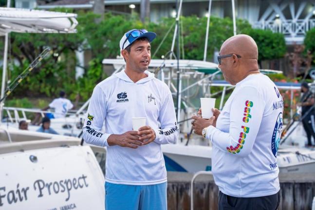 Chris Berry (right) of Mayberry Investments  sharing a moment with Ken McNab, Governor of the Bay Islands (Honduras) at the Superstars of Port Antonio Blue Marlin Tournament yesterday.