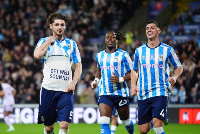 Coventry City’s Jack Rudoni (left) celebrates after scoring the opening goal during the English Premier League football match against Newcastle United in Coventry, England, yesterday.