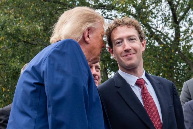 AP 
President Donald Trump talks with Meta CEO Mark Zuckerberg as he speaks with reporters outside the West Wing of the White House on Tuesday, September 29, in Washington. 